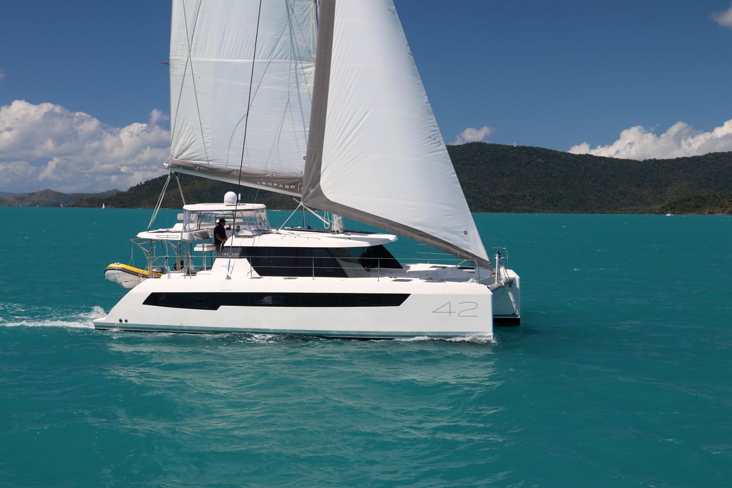 Kiana Rose Leopard 42 On water side view - Whitsunday Escape™